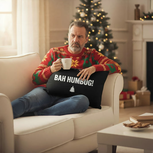 Grumpy old man cuddling Bah Humbug Black Christmas Cushion