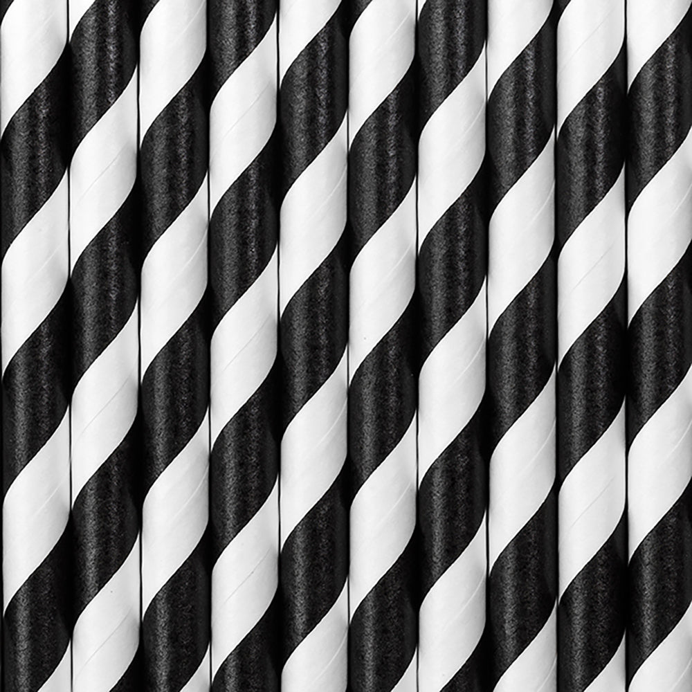 A collection of black and white striped paper straws.