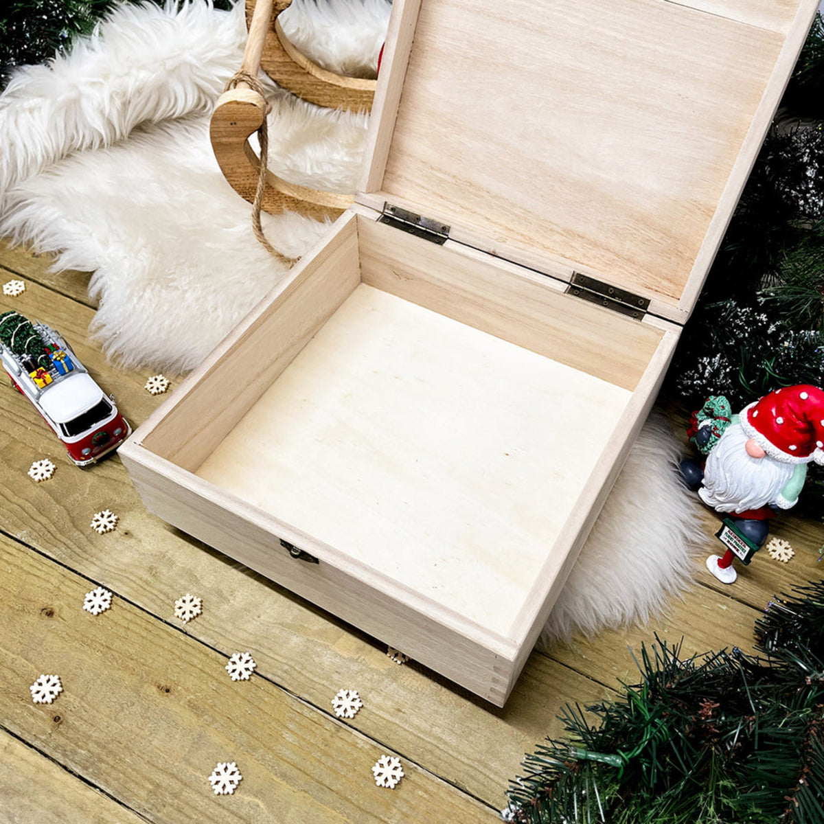 An open wooden Christmas Eve Box