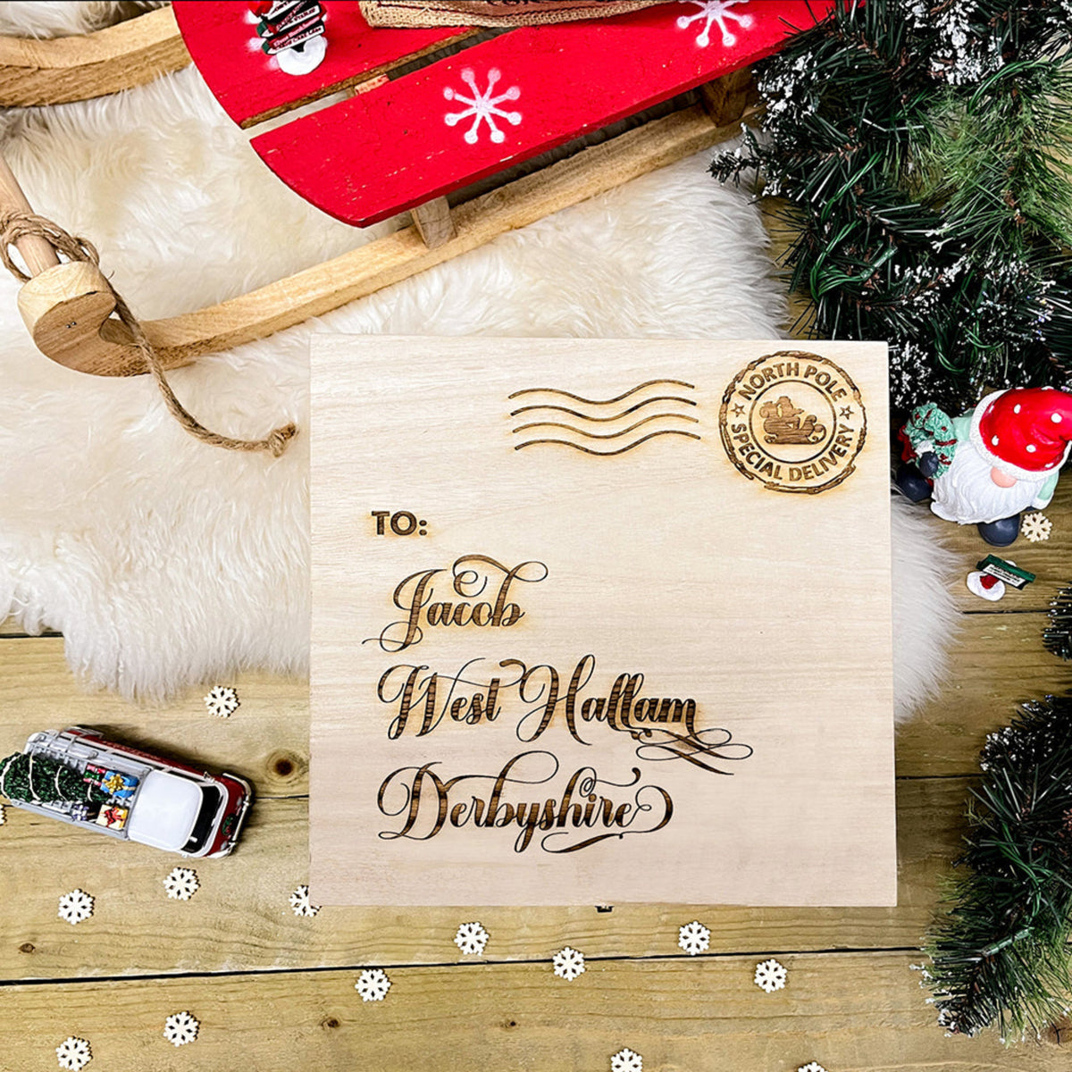 A personalised Christmas Eve Box with address and delivery details.  