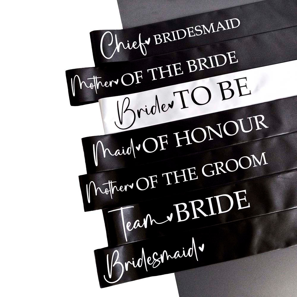 The Team Bride Hen Party Sash range including Bride to Be, Bridesmaid, Maid of Honour, Team Bride, Mother of the Bride and Groom, and Chief Bridesmaid. 