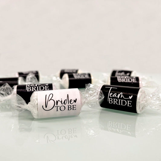 A set of Team Bride Hen Party Sweets in black and white. As well as Bride to Be Sweets in white and black. 