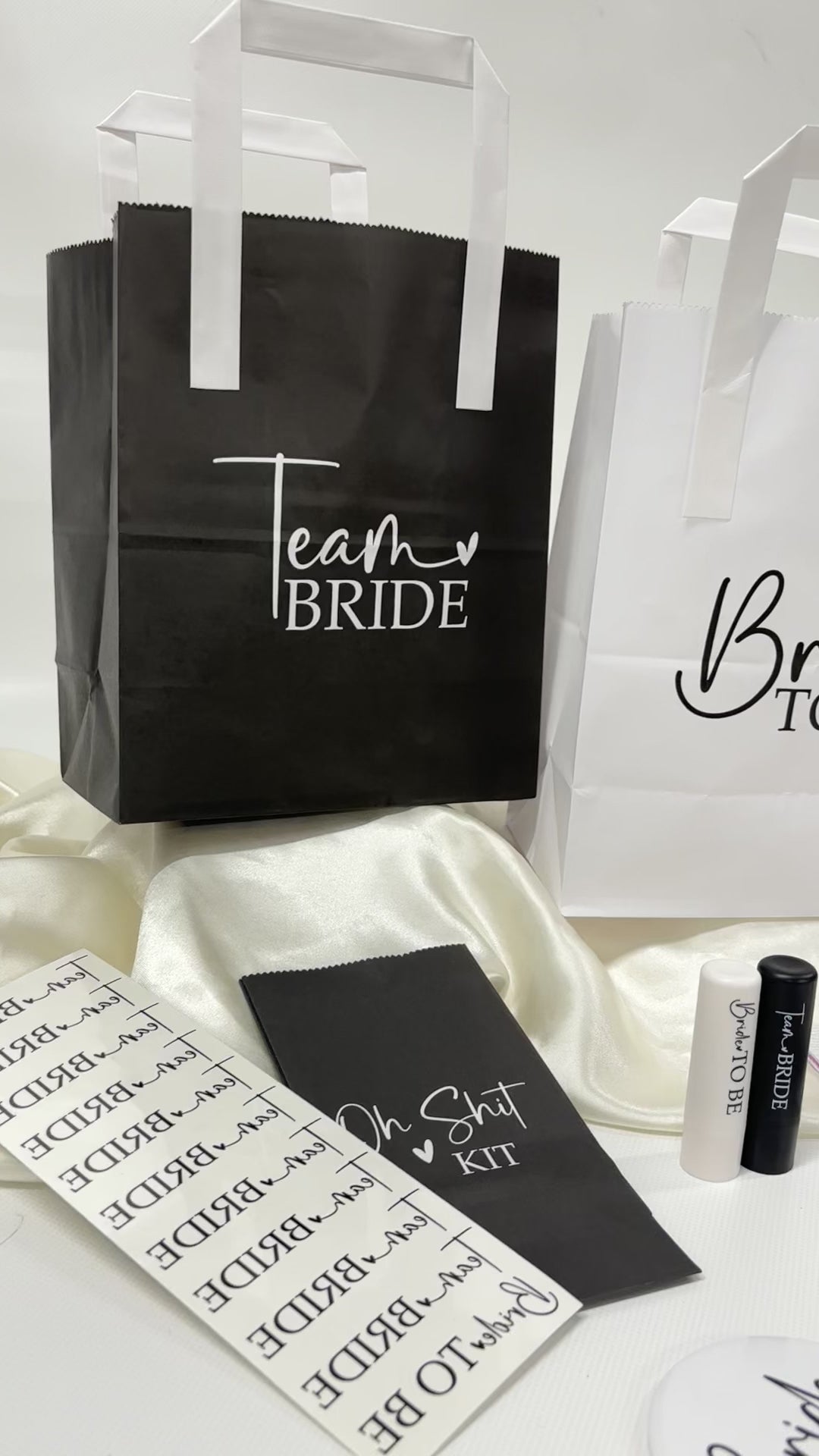 Black and white team bride hen party goodie bags video which also shows matching team bride hen party goodie bag fillers. 