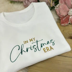 In My Christmas Era Jumper In White, Gold and Green Glitter